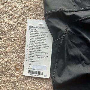 Lululemon black bike shorts with pockets; size 8